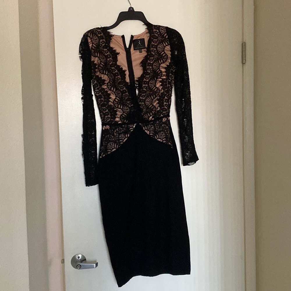 Beautiful black cocktail dress, never wore, just tried on.